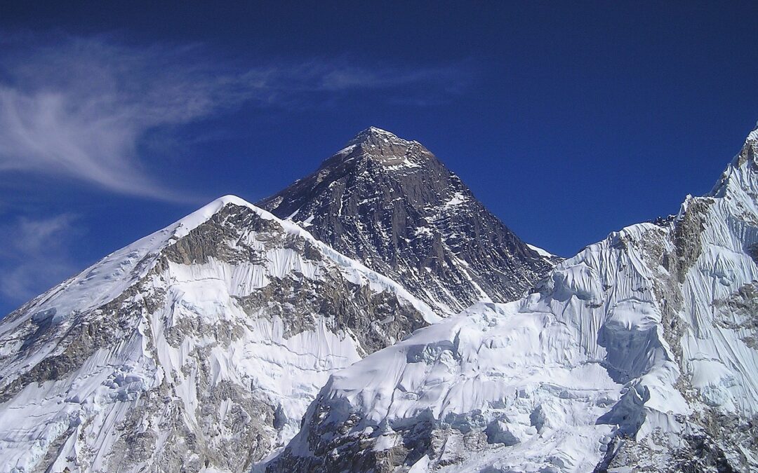 The top of a snow-covered mountain.