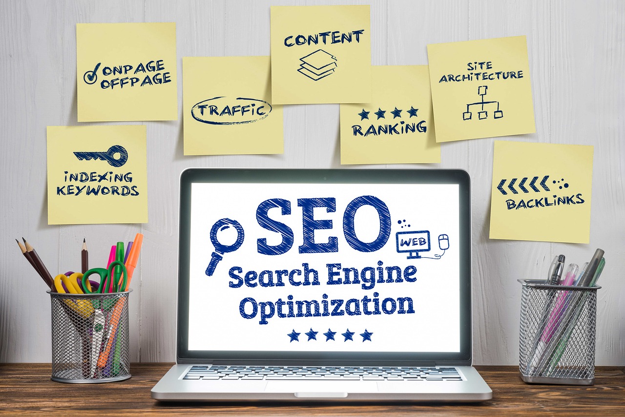 Search Engine Optimization Orange County. Orange County SEO Company. SEO Company Orange County. The words Search engine optimization displayed on a laptop. There are containers with pens, pencils and scissors on the left and right of the laptiop. This image was found on Pixabay and is used according to Pixabay's license.